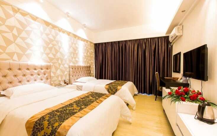 Imagen de la habitación del Hotel Foshan Dream Apartment. Foto 14