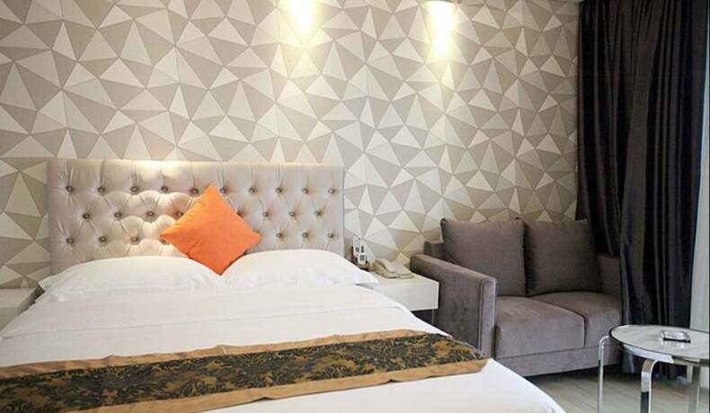 Imagen de la habitación del Hotel Foshan Dream Apartment. Foto 16