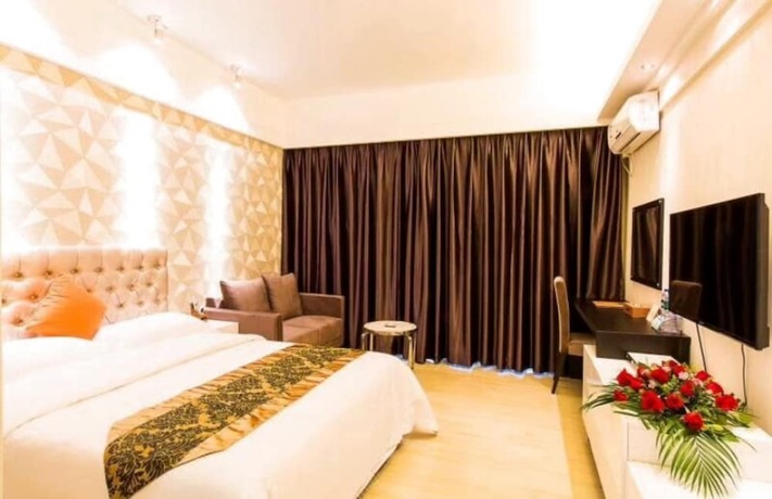 Imagen de la habitación del Hotel Foshan Dream Apartment. Foto 17