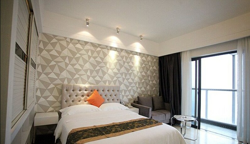 Imagen de la habitación del Hotel Foshan Dream Apartment. Foto 21