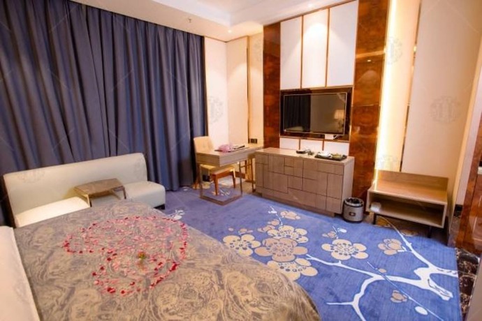 Imagen de la habitación del Hotel Foshan Huasheng Business. Foto 3