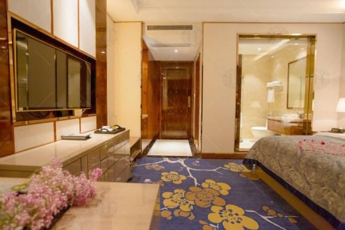 Imagen de la habitación del Hotel Foshan Huasheng Business. Foto 9