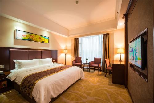Imagen de la habitación del Hotel Foshan Jiagao Business. Foto 5