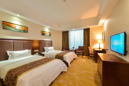 Imagen general del Hotel Foshan Jiagao Business. Foto 1