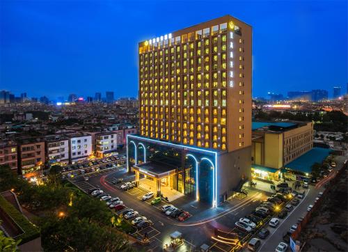 Imagen de la habitación del Hotel Foshan Jiagao Business. Foto 6
