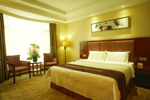 Imagen de la habitación del Hotel Foshan Jiagao Business. Foto 8