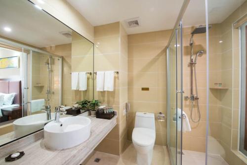 Imagen de la habitación del Hotel Foshan Jiagao Business. Foto 9