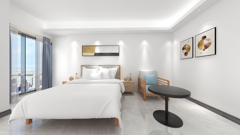 Imagen de la habitación del Hotel Foshan Laide Gongyu. Foto 13