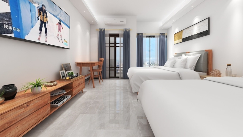 Imagen de la habitación del Hotel Foshan Laide Gongyu. Foto 19