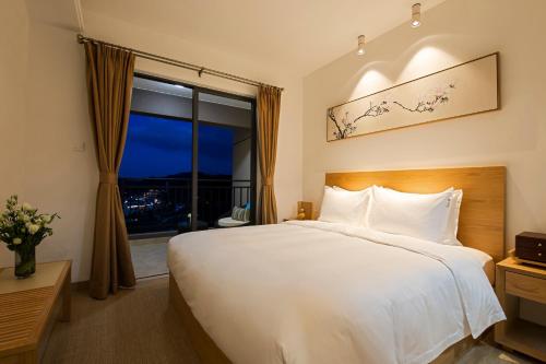 Imagen de la habitación del Hotel Foshan Ln Garden. Foto 5