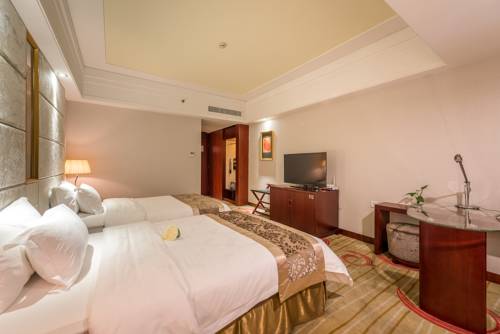 Imagen de la habitación del Hotel Foshan Pasonda. Foto 1