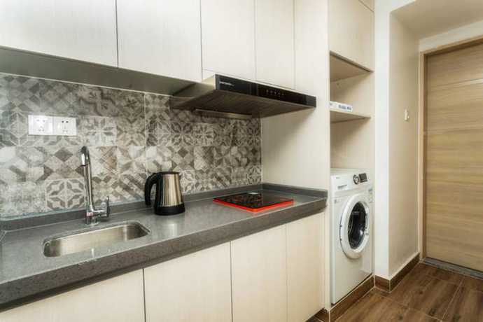 Imagen de la habitación del Hotel Foshan Sunshinebeach. Foto 7