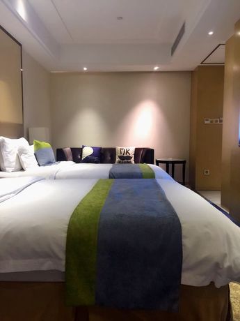 Imagen de la habitación del Hotel Foshan Tianguo Xingyue. Foto 9