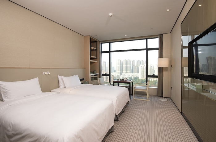 Imagen de la habitación del Hotel Foshan Virtuous World. Foto 2
