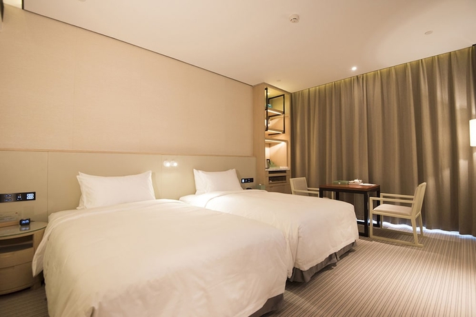 Imagen de la habitación del Hotel Foshan Virtuous World. Foto 3