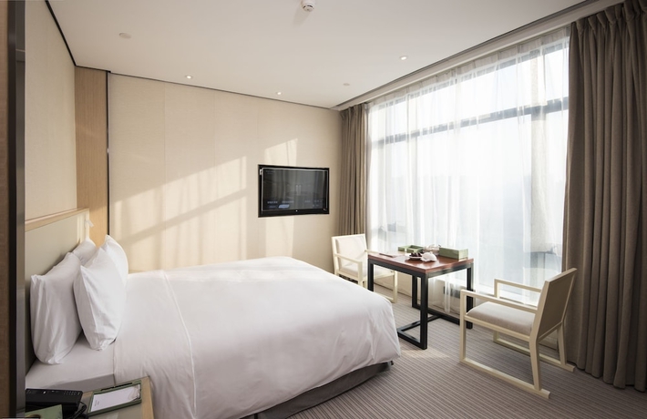 Imagen de la habitación del Hotel Foshan Virtuous World. Foto 8