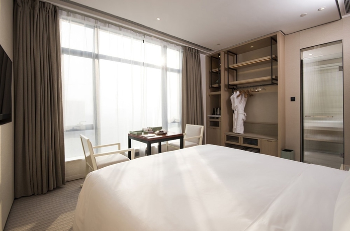 Imagen de la habitación del Hotel Foshan Virtuous World. Foto 9