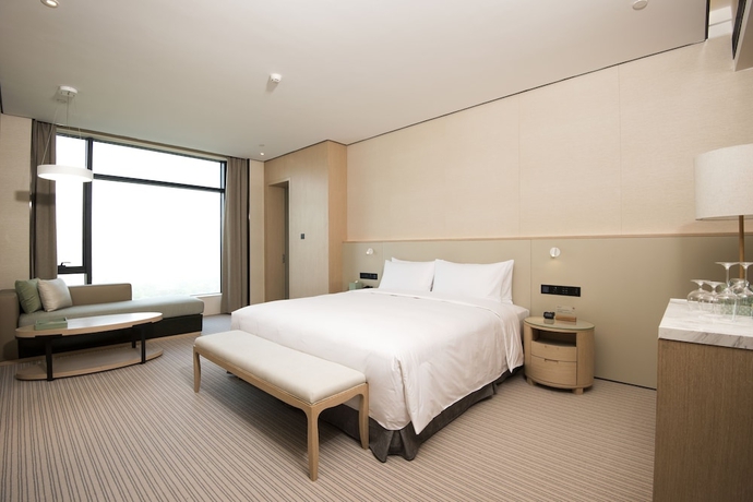 Imagen de la habitación del Hotel Foshan Virtuous World. Foto 10