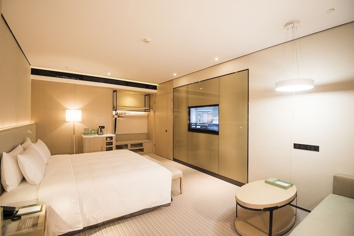 Imagen de la habitación del Hotel Foshan Virtuous World. Foto 12
