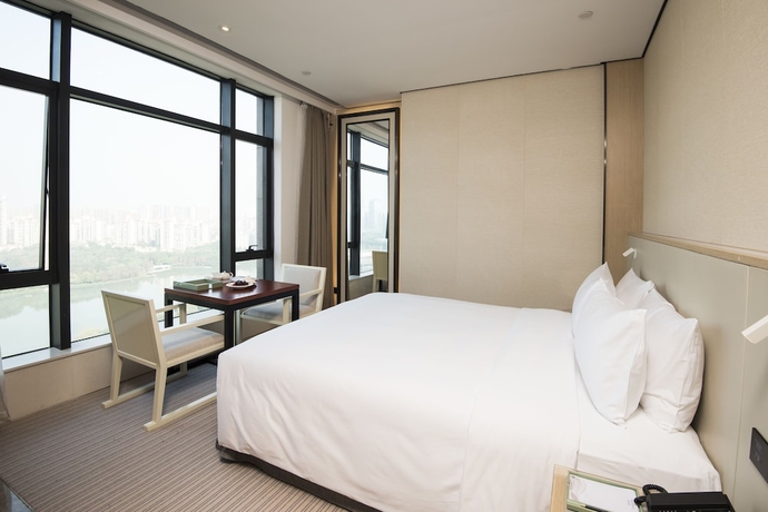 Imagen de la habitación del Hotel Foshan Virtuous World. Foto 13