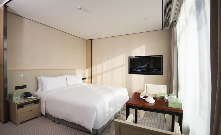 Imagen de la habitación del Hotel Foshan Virtuous World. Foto 14