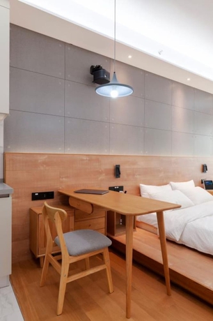 Imagen de la habitación del Hotel Foshan Wowa International. Foto 18