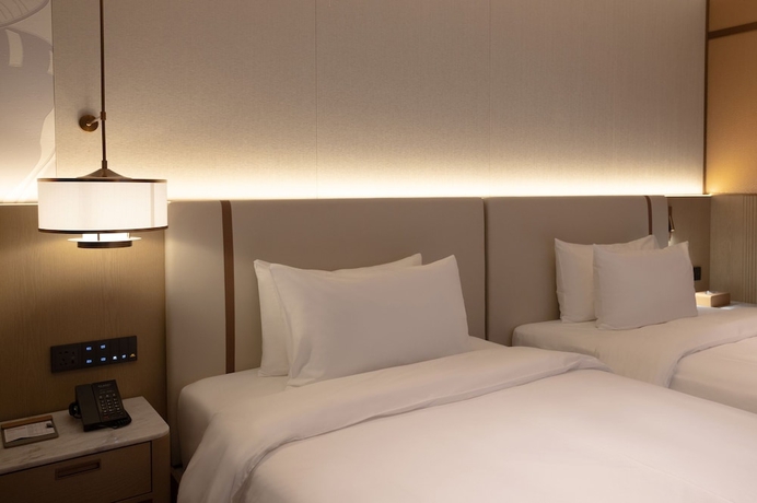 Imagen de la habitación del Hotel Foshan Xinghai Royal. Foto 5