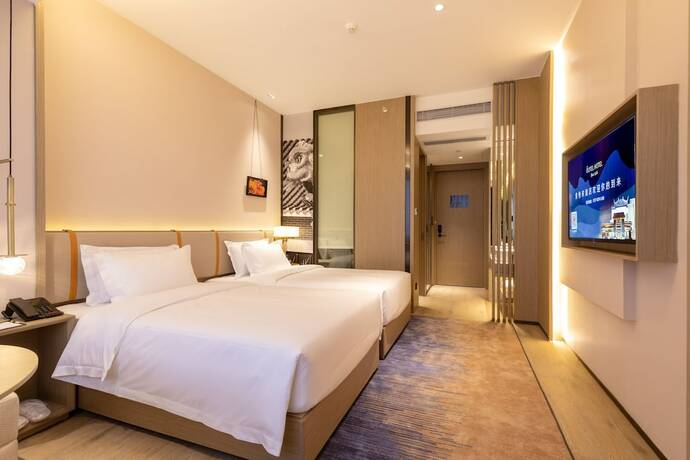 Imagen de la habitación del Hotel Foshan Xinxuangong. Foto 14