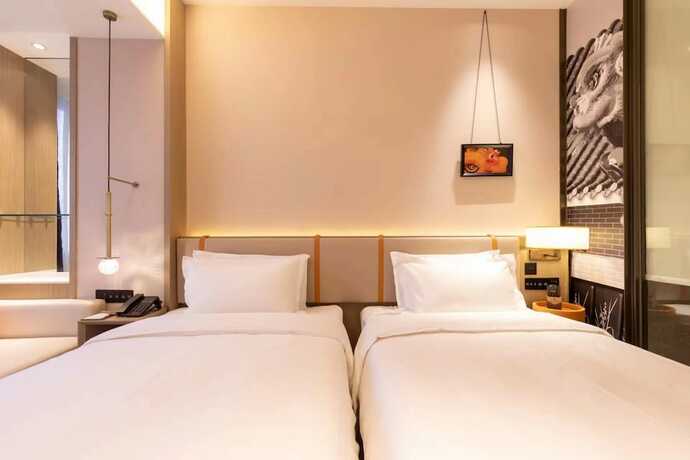 Imagen de la habitación del Hotel Foshan Xinxuangong. Foto 25