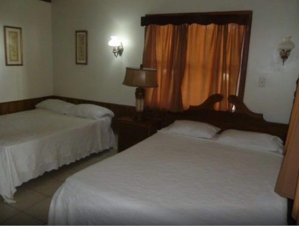 Imagen de la habitación del Hotel Foster's West Bay Resort. Foto 8