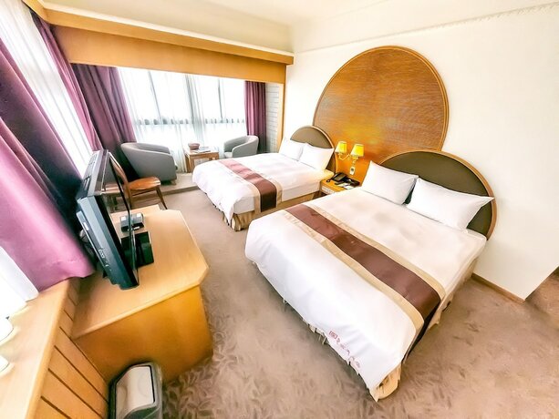 Imagen de la habitación del Hotel Foung Jia. Foto 26