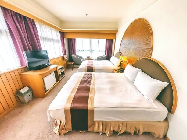 Imagen de la habitación del Hotel Foung Jia. Foto 32