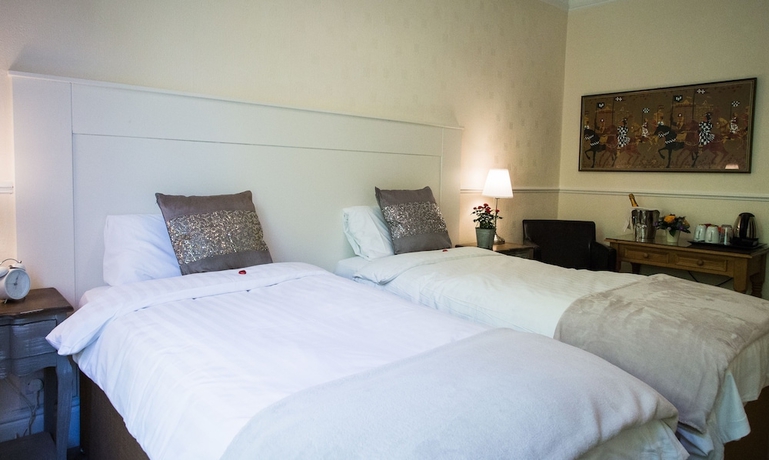 Imagen de la habitación del Hotel Fountains Guest House. Foto 5
