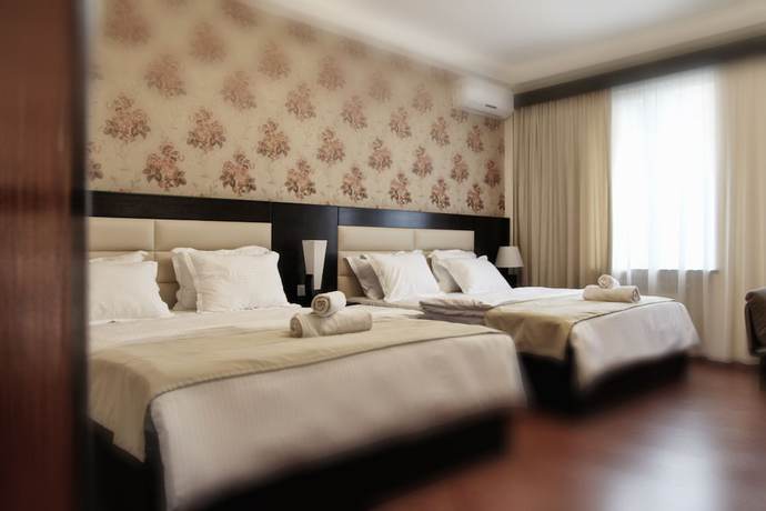 Imagen de la habitación del Hotel Four Brothers. Foto 8