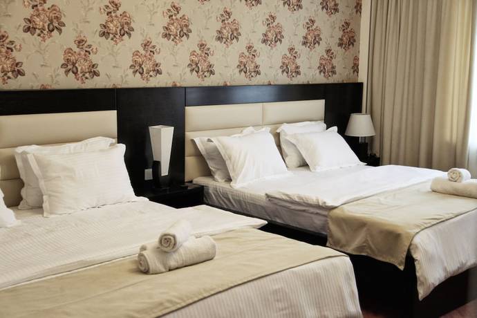 Imagen de la habitación del Hotel Four Brothers. Foto 11