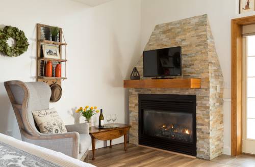 Imagen de la habitación del Hotel Four Chimneys Inn. Foto 2