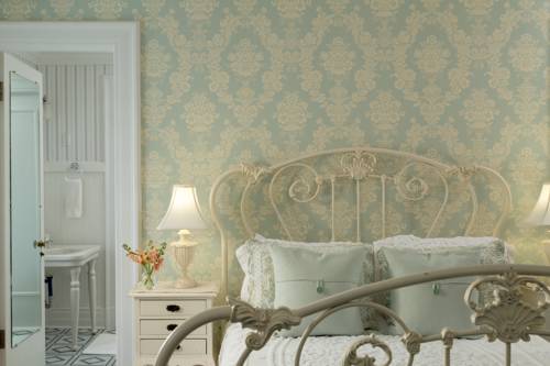 Imagen de la habitación del Hotel Four Chimneys Inn. Foto 7