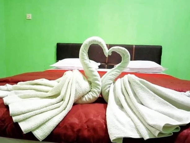 Imagen de la habitación del Hotel Four Hostel Bandar Lampung. Foto 3