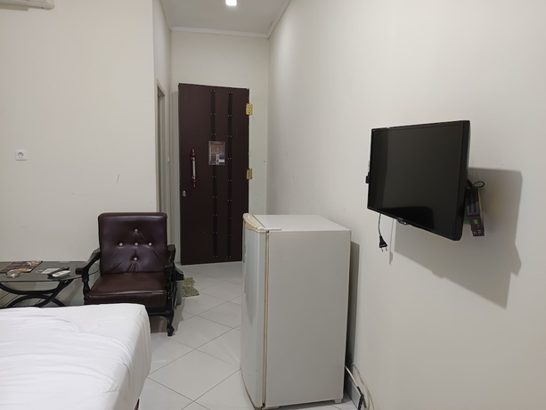 Imagen de la habitación del Hotel Four Hostel Bandar Lampung. Foto 5
