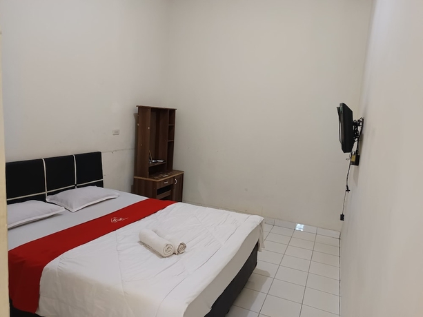 Imagen de la habitación del Hotel Four Hostel Bandar Lampung. Foto 6