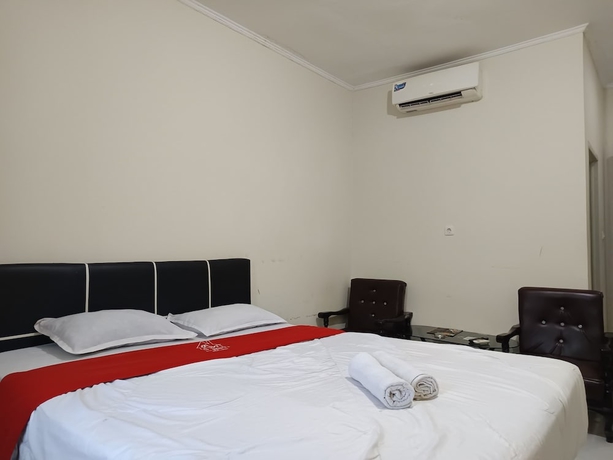 Imagen de la habitación del Hotel Four Hostel Bandar Lampung. Foto 7