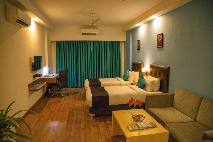 Imagen de la habitación del Hotel Four Leaf Service Suites. Foto 15