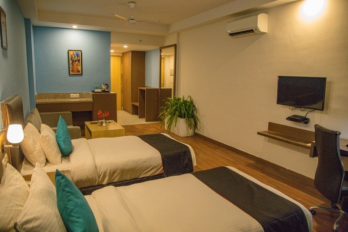 Imagen de la habitación del Hotel Four Leaf Service Suites. Foto 18