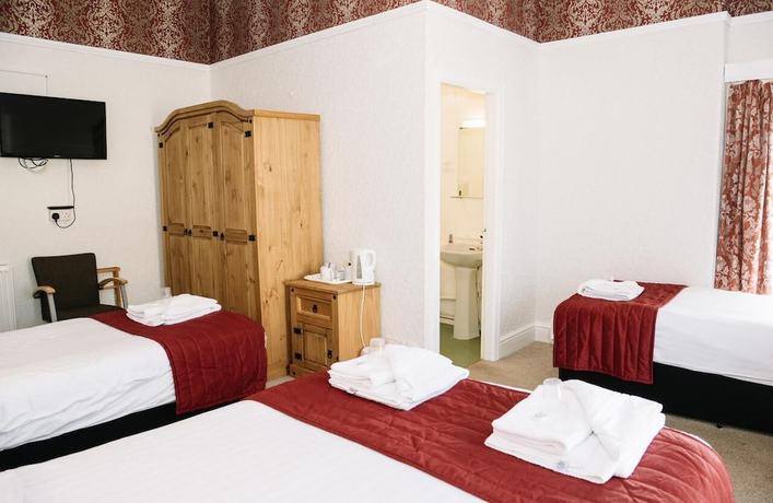 Imagen de la habitación del Hotel Four Oaks. Foto 2