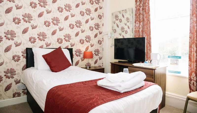 Imagen de la habitación del Hotel Four Oaks. Foto 7