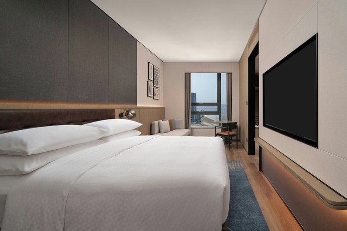 Imagen de la habitación del Hotel Four Points By Sheraton Dalian Donggang. Foto 13