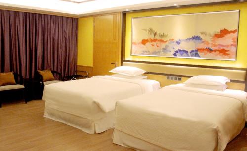 Imagen de la habitación del Hotel Four Points By Sheraton Heyuan Resort. Foto 6