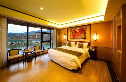 Imagen de la habitación del Hotel Four Points By Sheraton Heyuan Resort. Foto 9