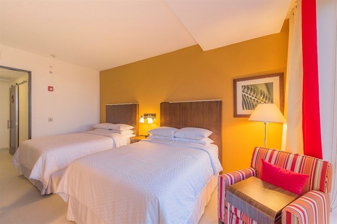 Imagen de la habitación del Hotel Four Points By Sheraton Puntacana Village. Foto 8
