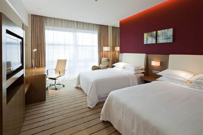Imagen de la habitación del Hotel Four Points By Sheraton Qingdao Chengyang. Foto 5